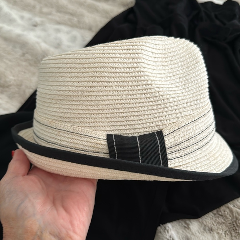 Beautiful designer off white and black ladies hat never worn.